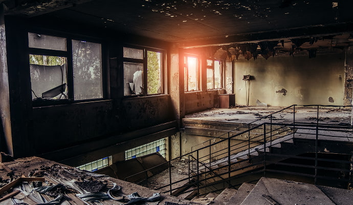 Fire-damaged interior of a commercial property Interior of a commercial building severely damaged by fire