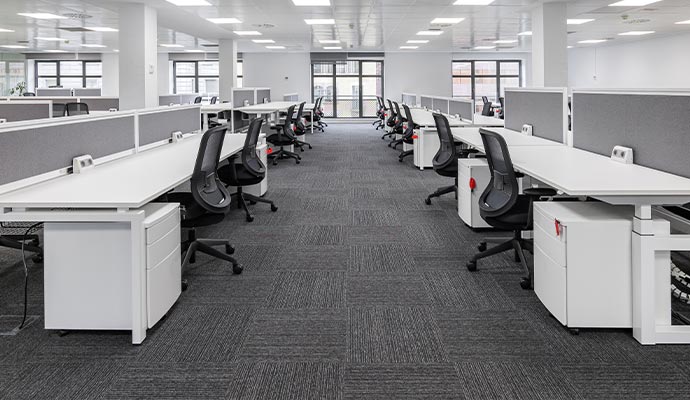 A modern office space with clean carpeting