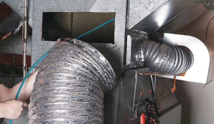 air duct cleaning with vacuum hose