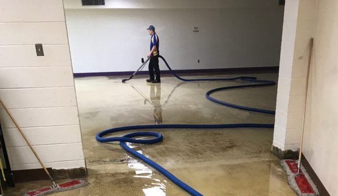 a professional restoring water damage