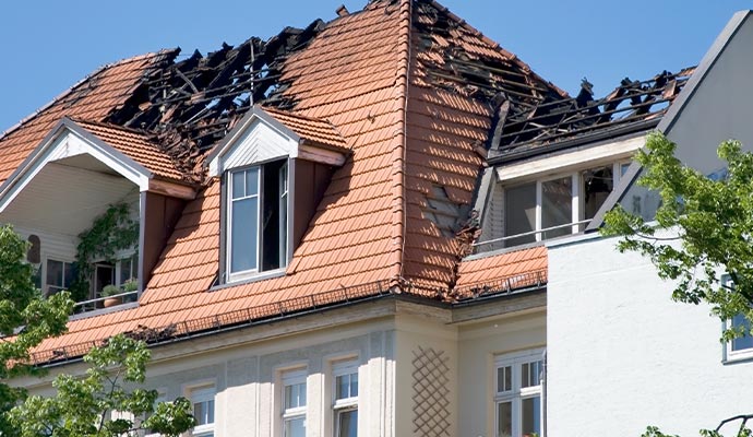 damaged house roof due to fire