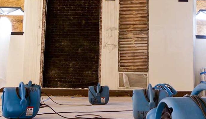 water damage restoration with dehumidifier