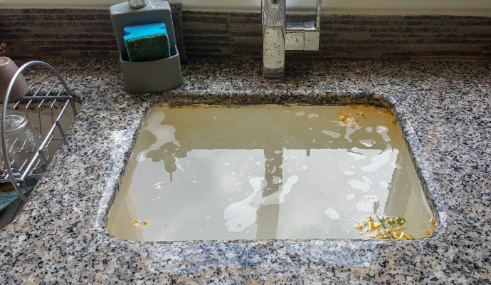 Close-up view of kitchen sink overflow