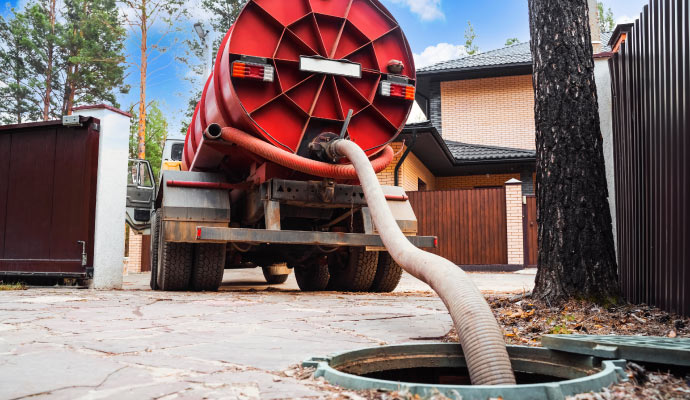 Removing sewage water using a sewage removal vehicle