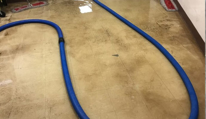 extracting water from a water damaged interior